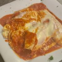 Pasta Combo · Lasagna, stuffed shell, and manicotti. Includes salad and two garlic rolls.