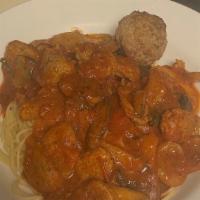 Spaghetti Speciale · Sausage, mushrooms and meatball includes salad and two garlic rolls.