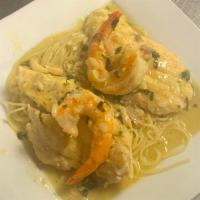 Chicken Scarpariello With Shrimp · Sautéed in a lemon butter sauce with garlic and shrimp includes salad and two garlic rolls.