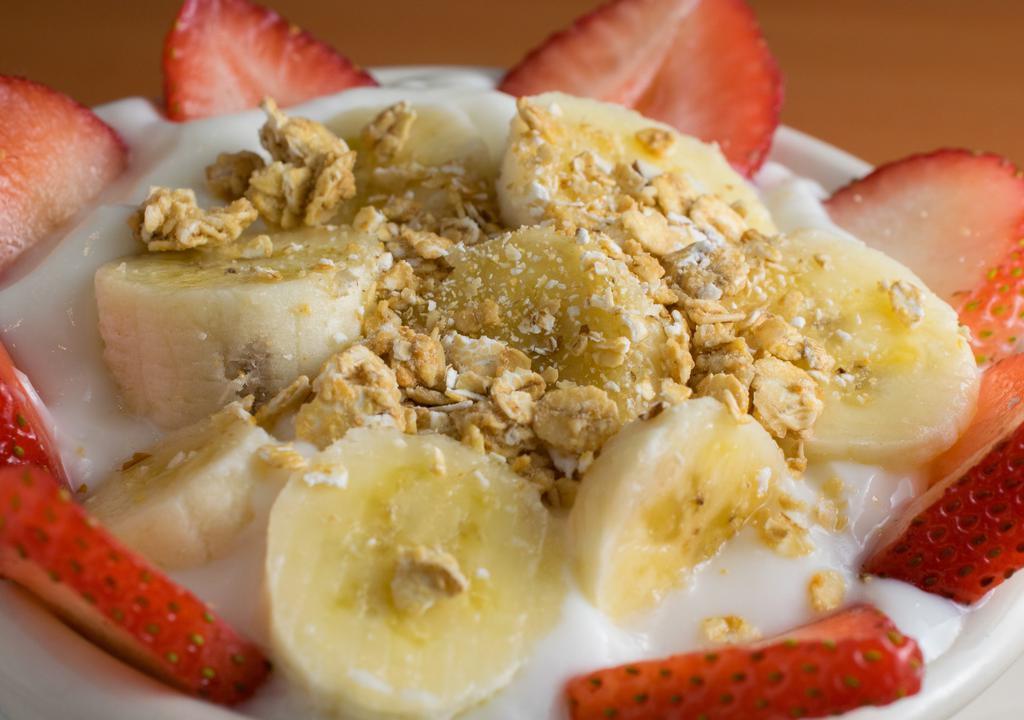 Yogurt Parfait · Yogurt, granola and mixed fruit.