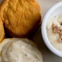 Biscuits & Gravy · Two biscuits smothered in country gravy.