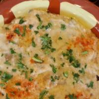 Baba Ghanoush · Grilled eggplant blended with tahineh and fresh lemon juice