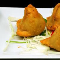 Samosa Per Ct.  · Spiced Potatoes, onions and peas wrap fillings.