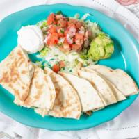 Chicken Quesadillas* · homemade flour tortillas stuffed with roasted chicken, monterey jack, green chiles, onions &...