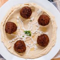 Hummus Plate · House made hummus served with a fresh in house made pita
OPTIONAL: Add 5 freshly made balls ...