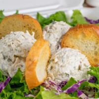 Chicken Salad Salad · Delicious homemade chicken salad served on a bed of greens. Made with chicken breast, red on...