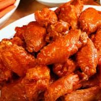 Wing Box · 25 bone in wings, choice of 2 sauces, cery sticks, Blue Cheese or Ranch Dressing & choice of...