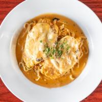 Chicken Bellisimo · Sautéed in a pink vodka sauce topped with fresh eggplant and mozzarella cheese.