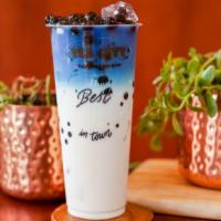 Coconut Butterfly Milk Tea · Served with non-dairy creamer and tapioca.
