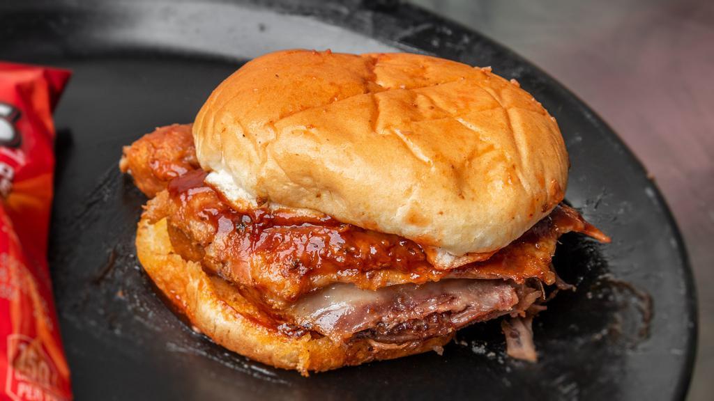 Rib Sandwich · Smoked ribs with meat that we guarantee will fall off the bone!