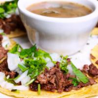 Street Tacos · 5 beef fajita street size tacos with onions, cilantro, on a corn tortilla and served with ch...