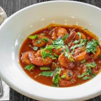 Shrimp Curry  · Shrimp Curry Homestyle, spicy curry sautéed in tomatoes and onions.