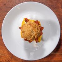 The Grizzly · Scratch made cat head biscuit stuffed with a cheesy omelet, more cheese, and sisters bacon t...