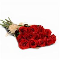 Roses In Regular Wrap · A bunch of 10-12 Roses either in one color or assorted colors, Please be noted colors are su...