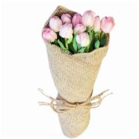 Deluxe Tulips In Burlap Wrap · Deluxe Tulips are full of petals and are wrapped in burlap wrap. Base price includes 10 Delu...