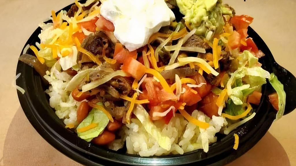 Sofia'S Bowl  · Our delicious protein bowls served with brown rice, pinto beans, lettuce, pico de gallo, cheese, sour cream and your choice of, Beef Fajita, Chicken Fajita, Pastor or Barbacoa.