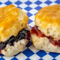 Bee Gee · One freshly baked buttermilk biscuit with butter and jam (local strawberry or grape).