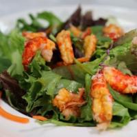 Garden Salad · Baby spring mix. Add protein for an additional charge.