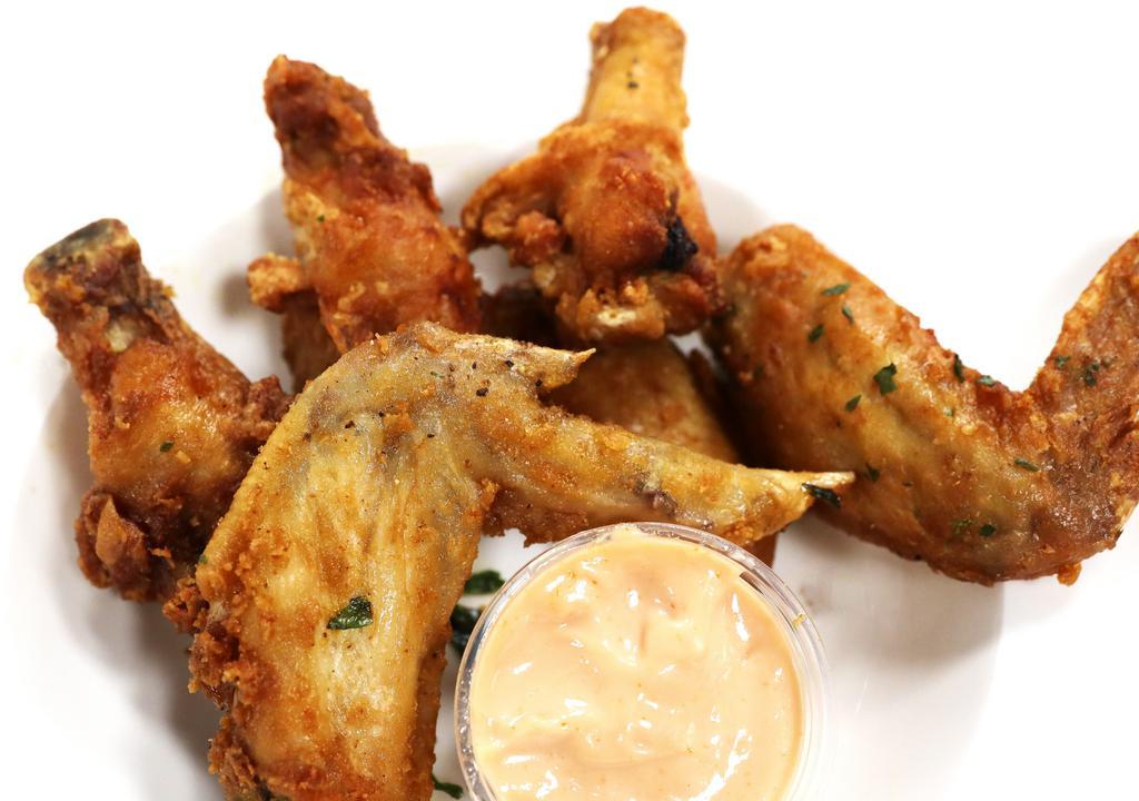 Famous Wings · Delicious crispy seasoned house wings loaded with flavor