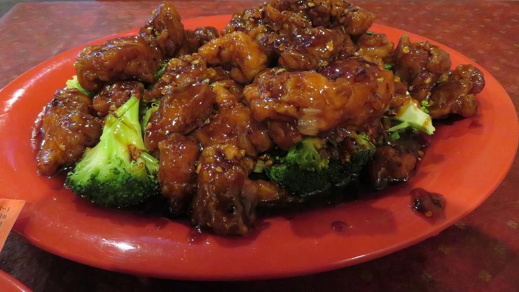 General Tso Chicken, Pork, Or Tofu · Hot and spicy .Choice of chicken, pork, or tofu and broccoli, lightly breaded in lotus flour, deep-fried and roasted in a spicy sauce.