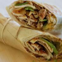 *Tex-Mex Press Shawarma (Spicy) · Included Toppings: Chicken, Onion, Bell Pepper Cheese, Tex-Mex Sauce, Flatbread.