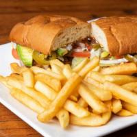 Torta Mexican Sandwich · Our traditional Mexican sandwich served with your choice of meat on Mexican bread topped wit...