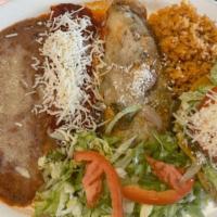 Chicken Mole Enchiladas · Three homemade corn tortillas dipped in our original special sauce and served with beans and...