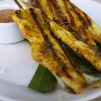 Grilled Chicken Satay · Three marinated sliced chicken breast skewers, grilled over open flame marinated in paste of...