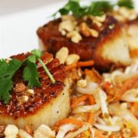 Seared Jumbo Georges Bank Sea Scallops · Three hand-harvested day boat scallops served over our signature pad Thai, pad Thai contains...