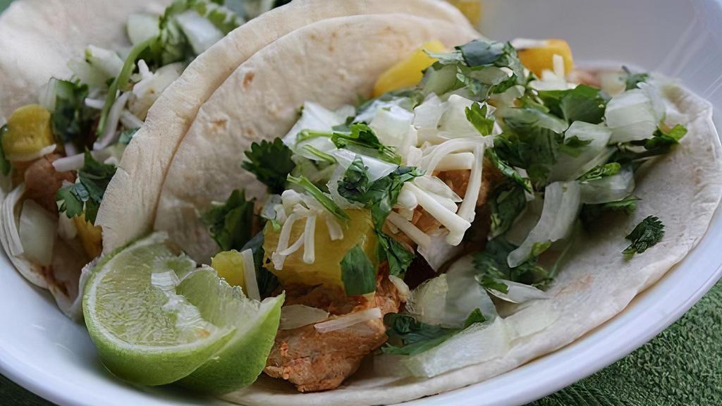 5 Tacos  Tacos De Pollo - Chicken · Go loco for our pollo! Authentic street tacos with chicken served on corn tortillas with a wedge of lime, cilantro, onion and salsa on the side.