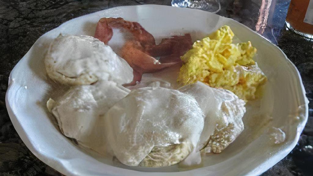 #22 Biscuits (2) & Gravy, Side Of Scrambled Eggs · 2 Biscuits with gravy, Side of scrambled eggs.