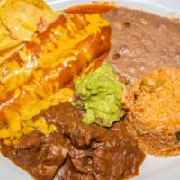 #2 El Gallo Plate · (Most Popular). 2 Enchiladas, Carne Guisada, Guacamole, Queso Chips, served with Rice and Re...