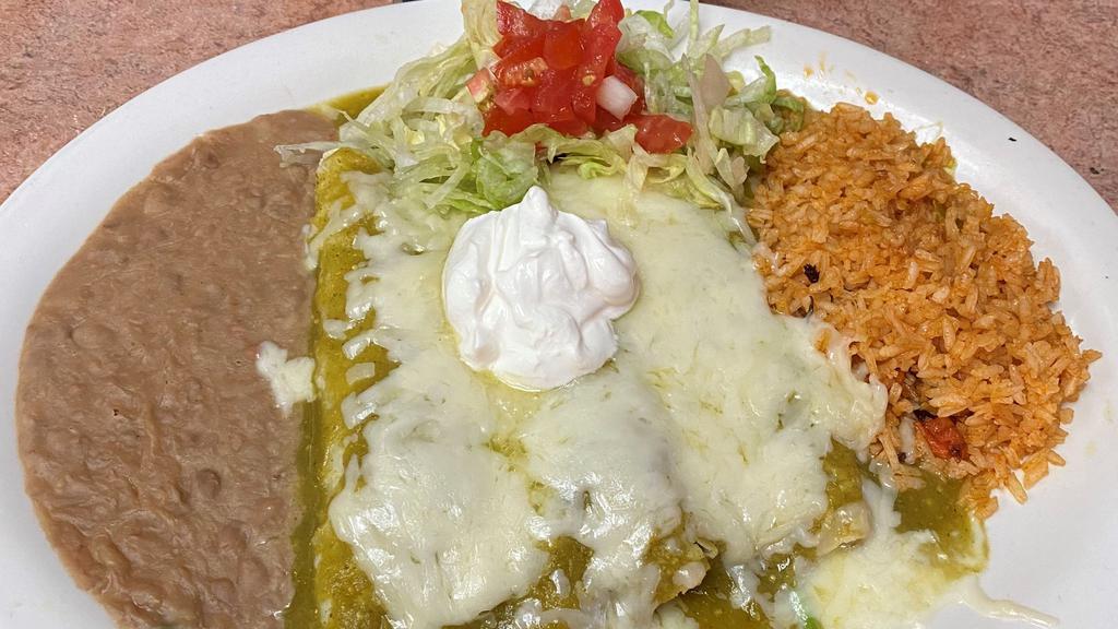 #38 Enchiladas Verde · (3) Chicken Enchiladas w/ Green Sauce and Sour Cream, served with Rice and Refried Beans.