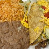 #14 Taco Plate · (2) Crispy Tacos (beef or chicken), topped with lettuce, tomato and cheese, served with Rice...