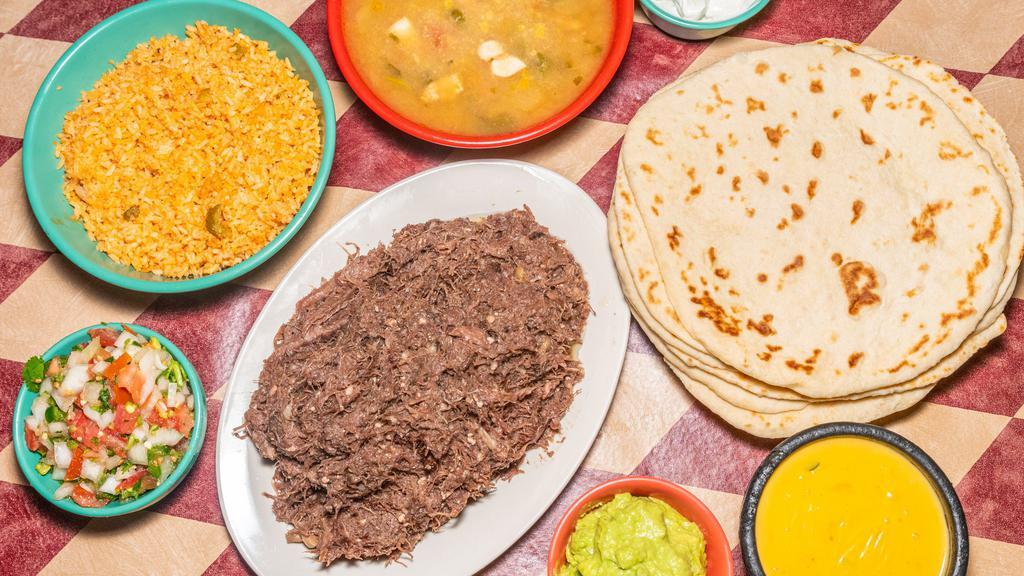 #6 Barbacoa Plate · Served with Pico de Gallo, Guacamole, served with Rice and Refried Beans.