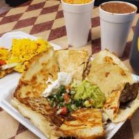 Fm: Quesadillas & (2) Puffy Tacos · (beef or chicken). Served with Pico de Gallo, Guacamole and Sour Cream, Pint of Beans and Ri...