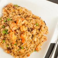 Crawfish Fried Rice · Crawfish, Egg, Onion, Peas & Carrots