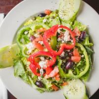 Greek Salad · Romaine lettuce tossed with fresh vegetables, imported kalamata olives, capers, tomatoes, pe...
