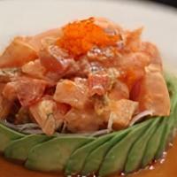Treasure Island ** · Spicy mixed tuna, yellowtail, salmon and escolar surrounded by avocado and ponzu sauce