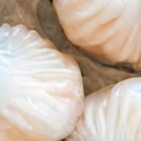 Har Gow (4) (Gf) 水晶虾饺 · Shrimp dumpling in a translucent wrapper.