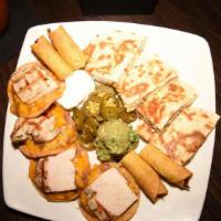Casa Mia Platter · Your choice of Chicken or Skirt steak quesadillas, nancho, chicken flautitas, guacamole and ...