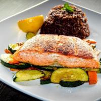 Grilled Salmon · Spice rubbed salmon served with gallo pinto and sautèed vegetables