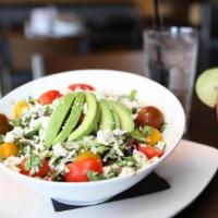 Chopped Salad · Mixed greens, cabbage, grape tomatoes and avocado