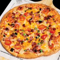 The Sun.^ · Red sauce, mozzarella, honey smoked ham, bourbon bacon, aged sharp cheddar, pineapple and to...
