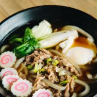 U1 Niku Udon · Light broth served with udon, thinly sliced beef, Japanese fish cakes, poached egg, bok choy...