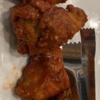 Burns Road Chicken Wings · Deep fried chicken wings, and tossed with house special hot sauce.