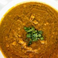 Lashkari Daal · Chick peas lentils Prepared with Chef's special blend of spices and herbs.