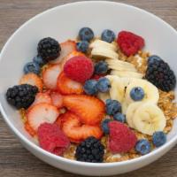 Parfait · Organic granola, sliced bananas, mixed berries, greek yogurt.
