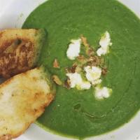 Broccoli Soup · Goat cheese & walnut finished with EVOO.