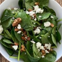 Spinach & Goat Cheese Salad · Spinach, goat cheese medallion, walnuts, citrus vinaigrette.